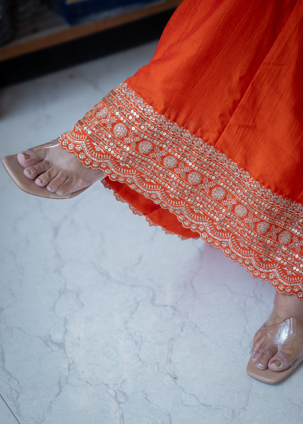 FANTA ORANGEANARKALI  WITH ZARI AND SEQUIENCE DETAILING