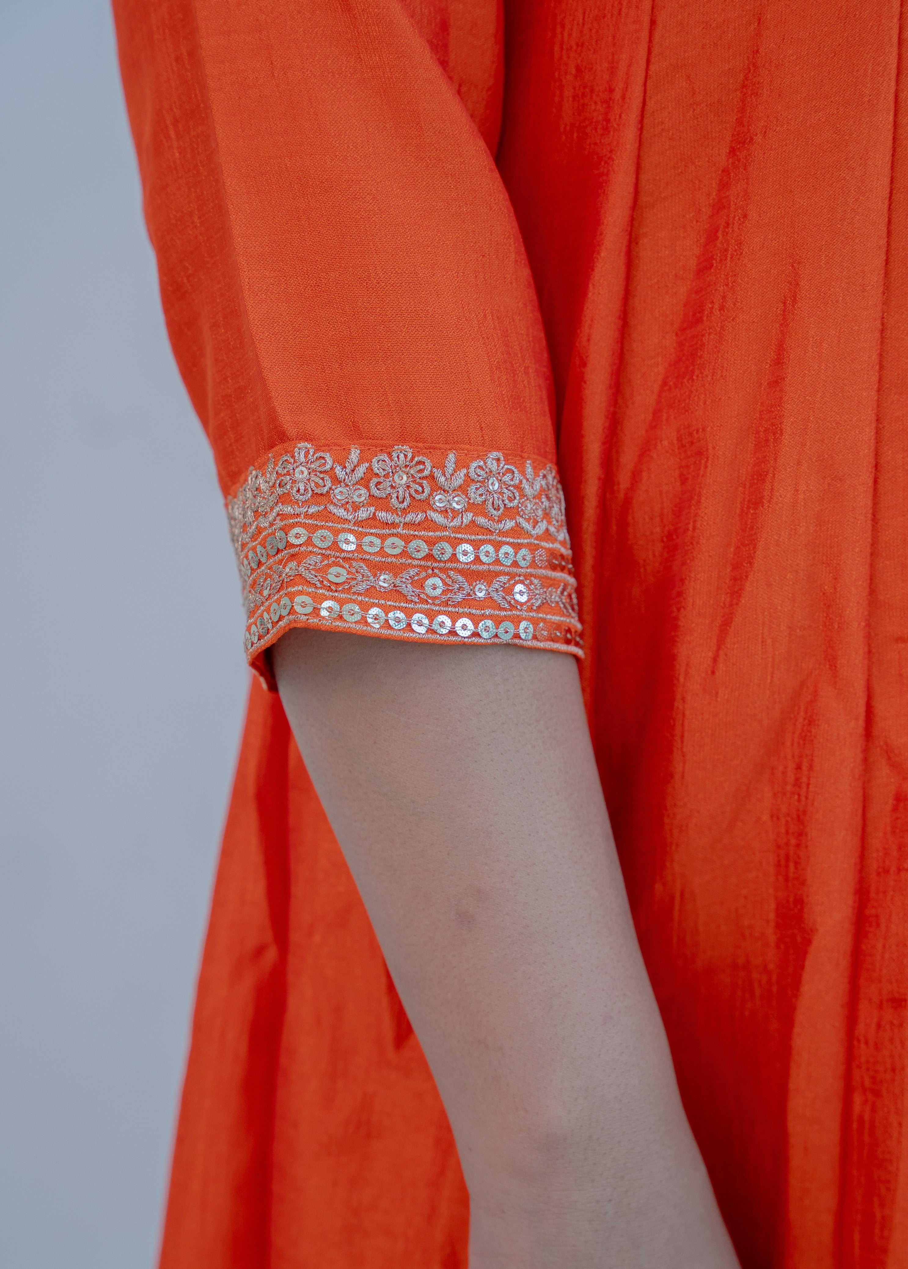 FANTA ORANGEANARKALI  WITH ZARI AND SEQUIENCE DETAILING