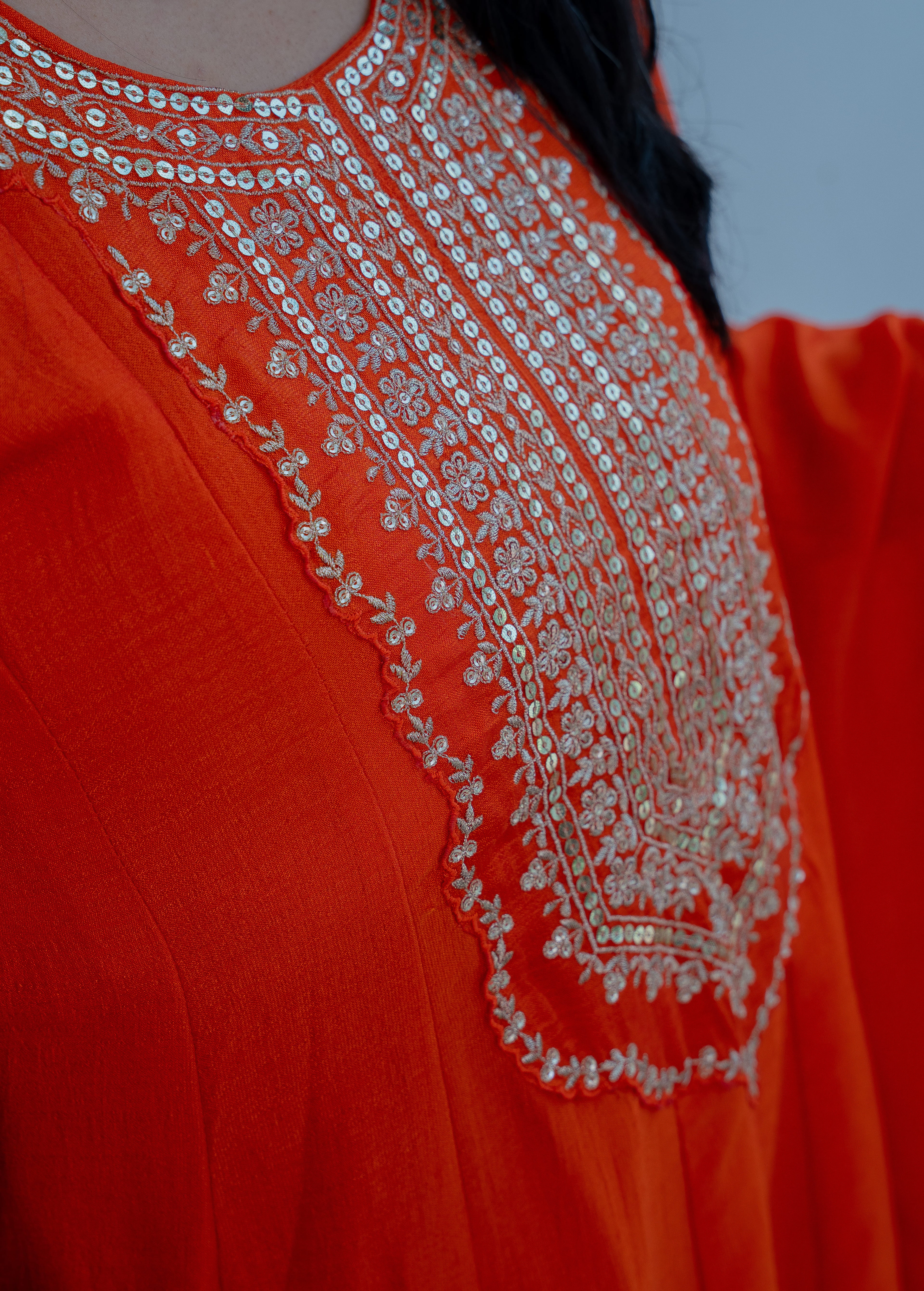 FANTA ORANGEANARKALI  WITH ZARI AND SEQUIENCE DETAILING
