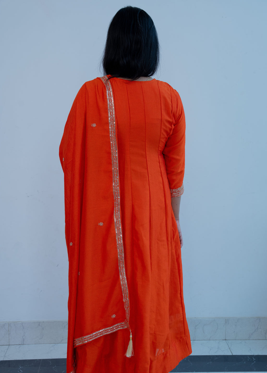 FANTA ORANGEANARKALI  WITH ZARI AND SEQUIENCE DETAILING