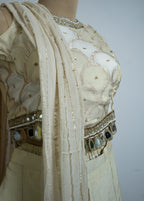 GOLDEN OFF WHITE  BROCADE EMBELLISHED MIRROR WORK TOP WITH PLAZZO SET