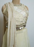 GOLDEN OFF WHITE  BROCADE EMBELLISHED MIRROR WORK TOP WITH PLAZZO SET